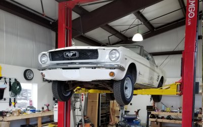 66 Mustang on lift for inspection